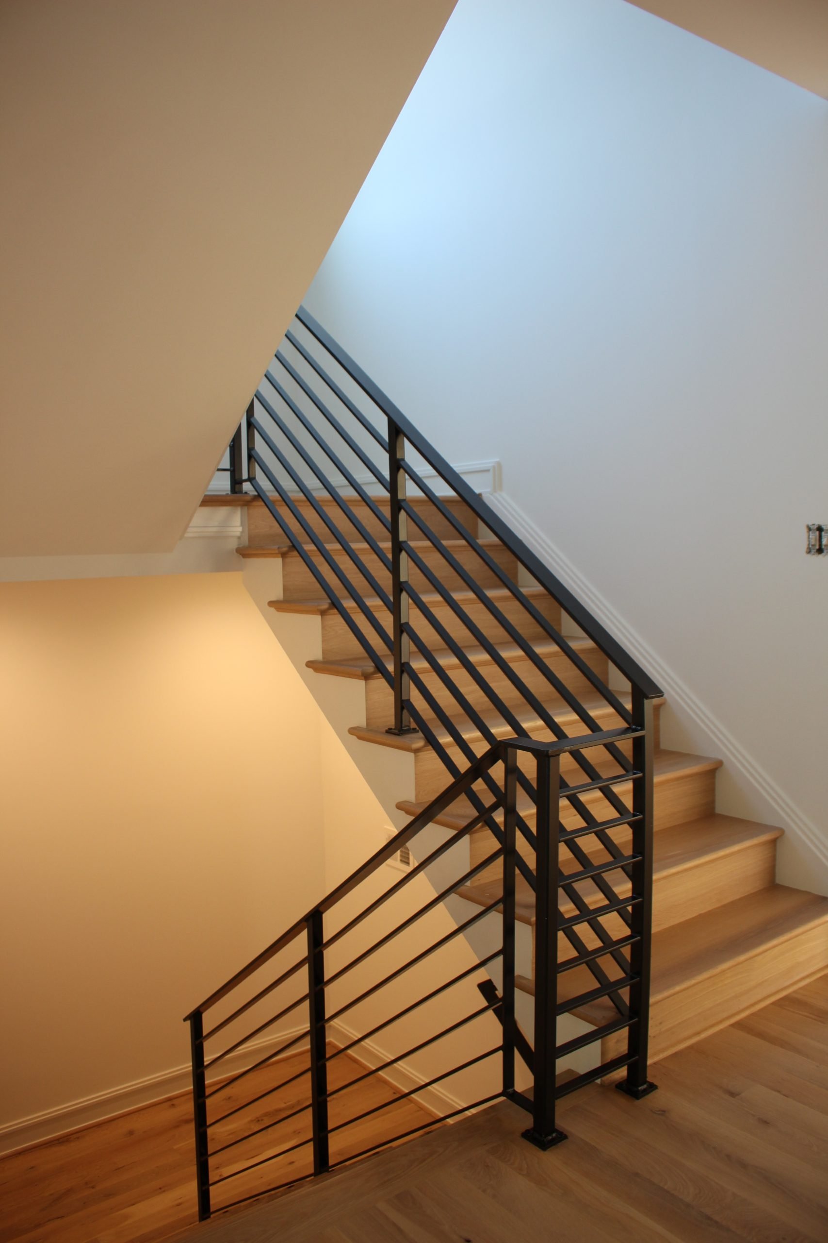 This showcases a completed loudoun stairs project within a home in northern virginia. This showcases the rails that they handmade. 