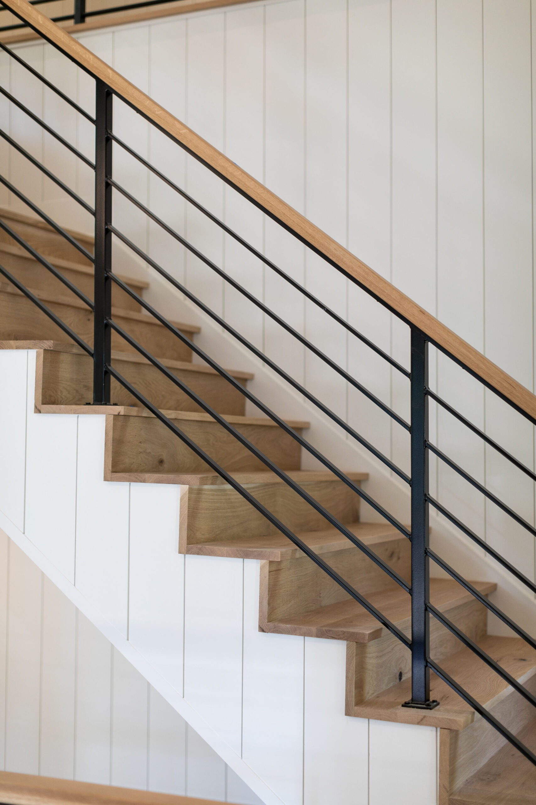 This showcases a completed loudoun stairs project within a home in northern virginia. This showcases the rails that they handmade. 